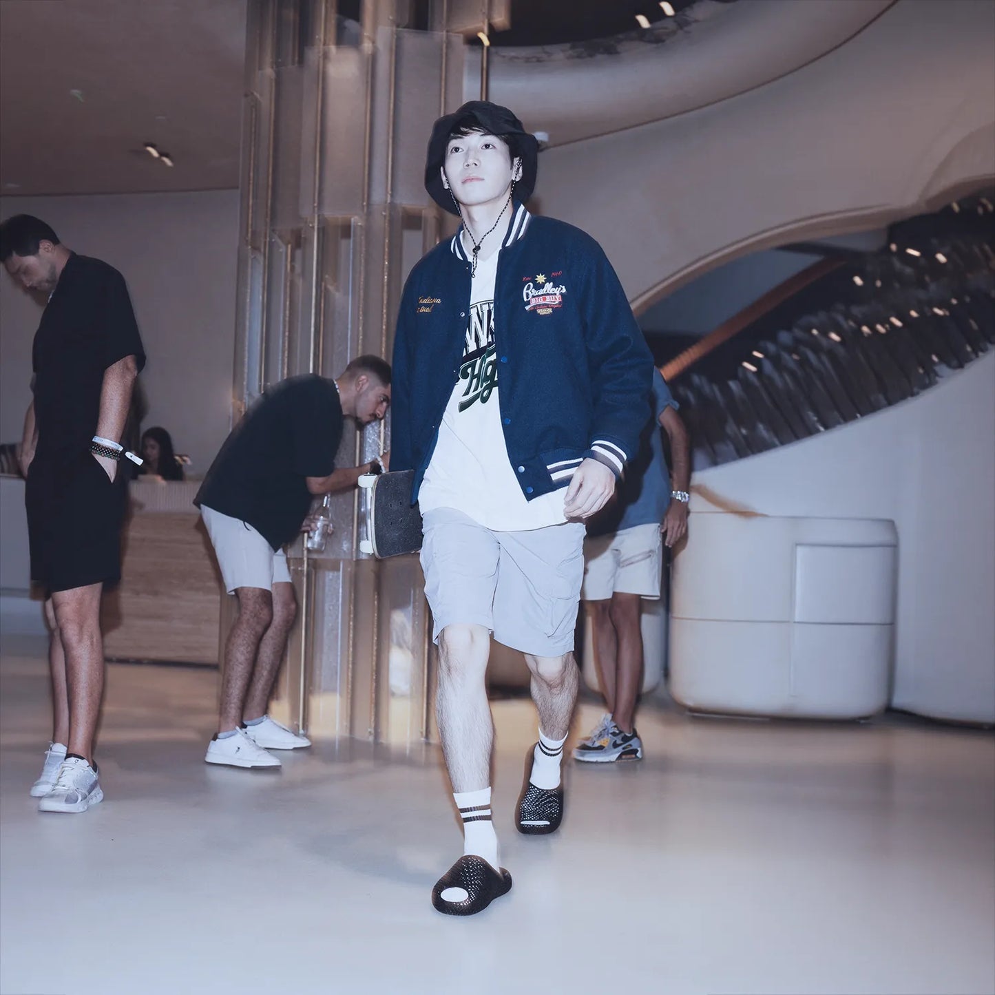 Model wearing versatile minimalist slides