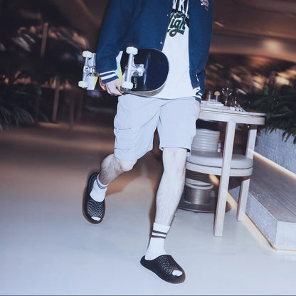 Model wearing versatile minimalist slides