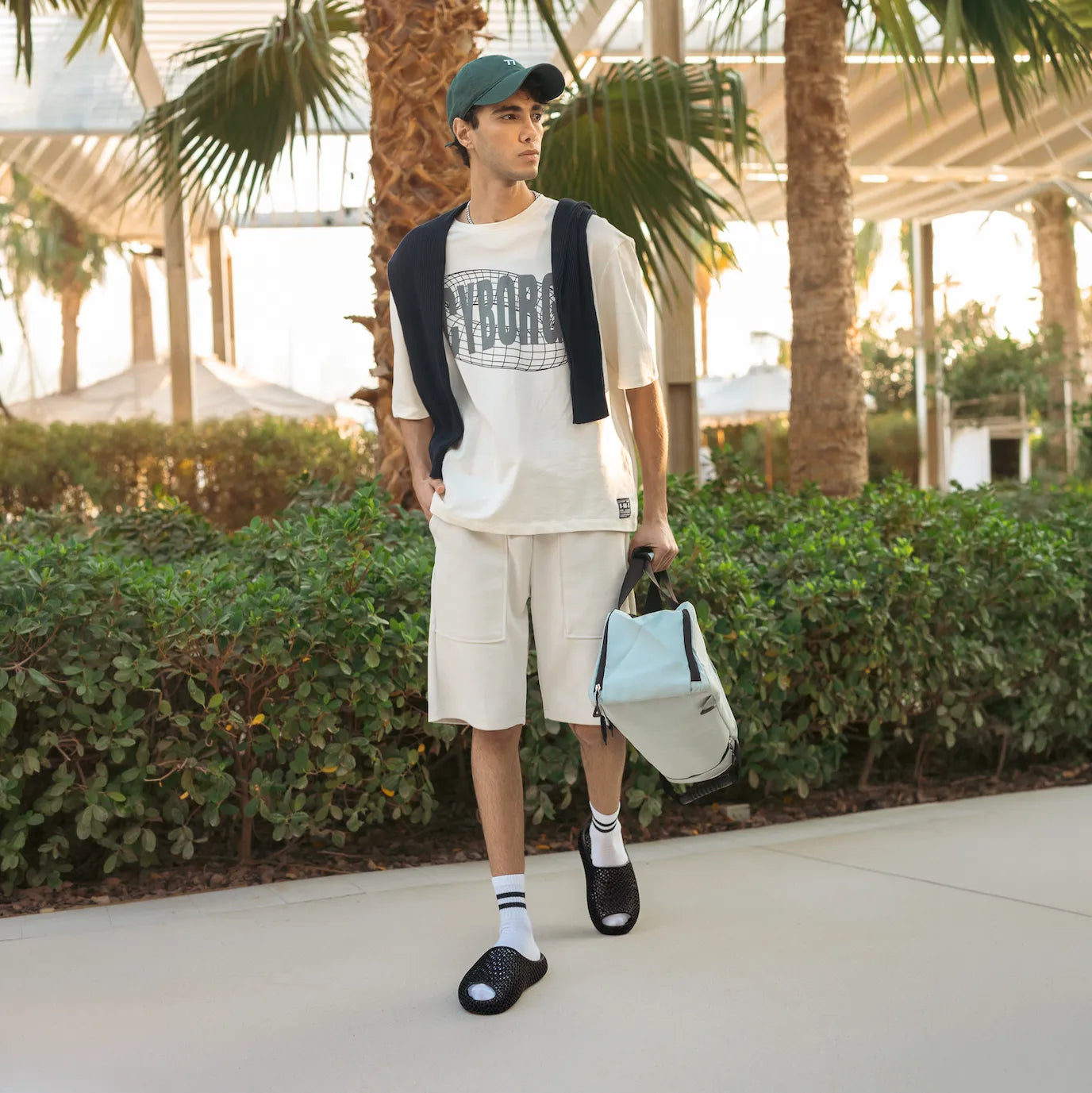 Model wearing versatile minimalist slides